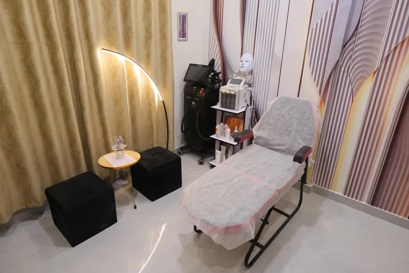 Procedure room at The Aesthetic Bar Clinic with a treatment couch and aesthetic equipment